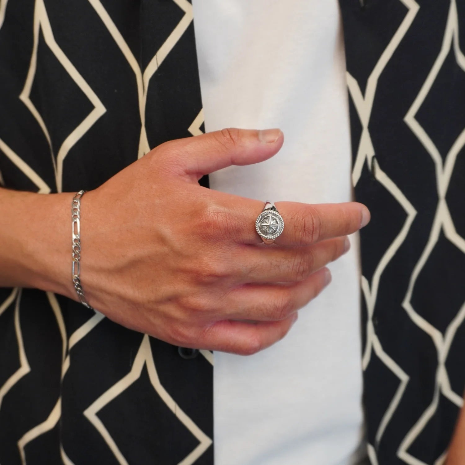 925 silver compass ring on hand front angle