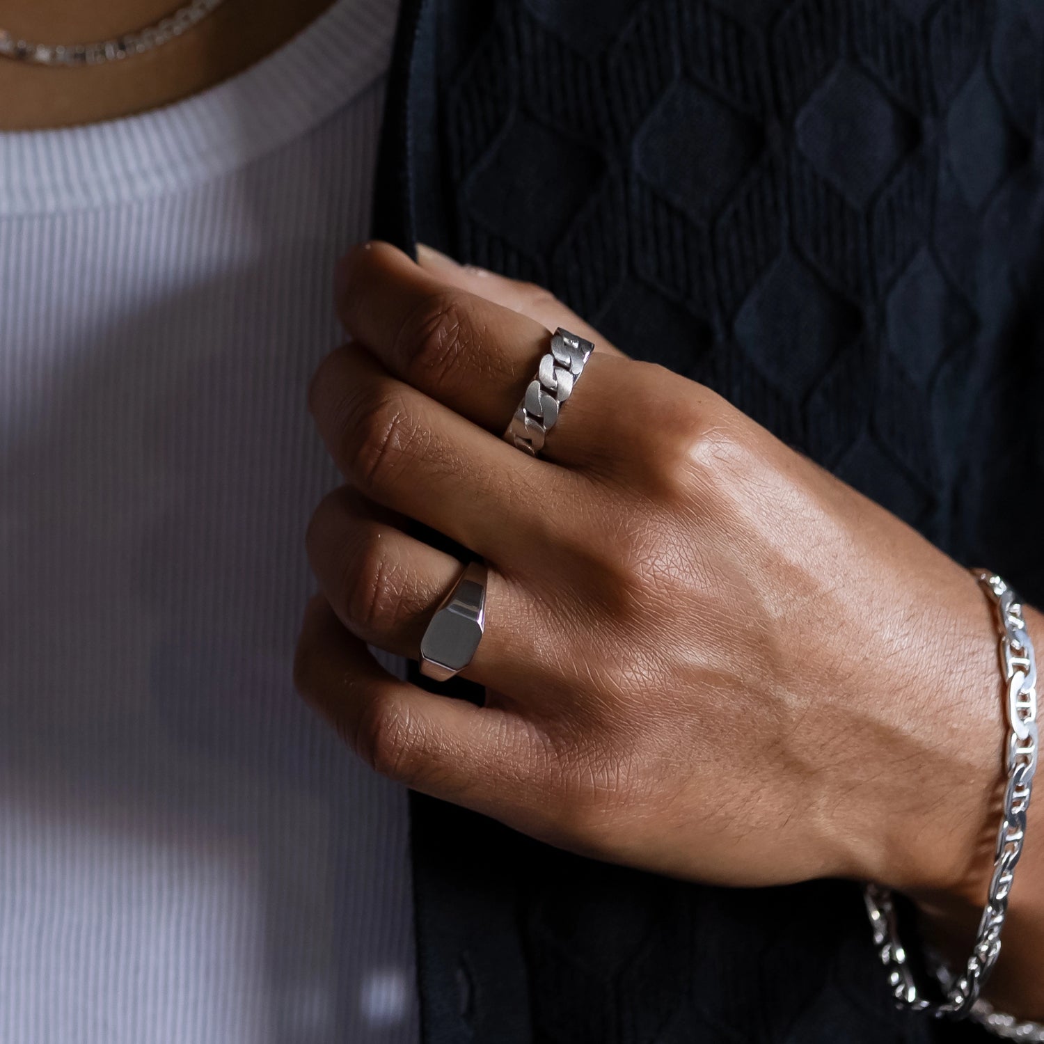 925 silver cuban link ring stacked with sterling silver square signet on the same hand zoomed out