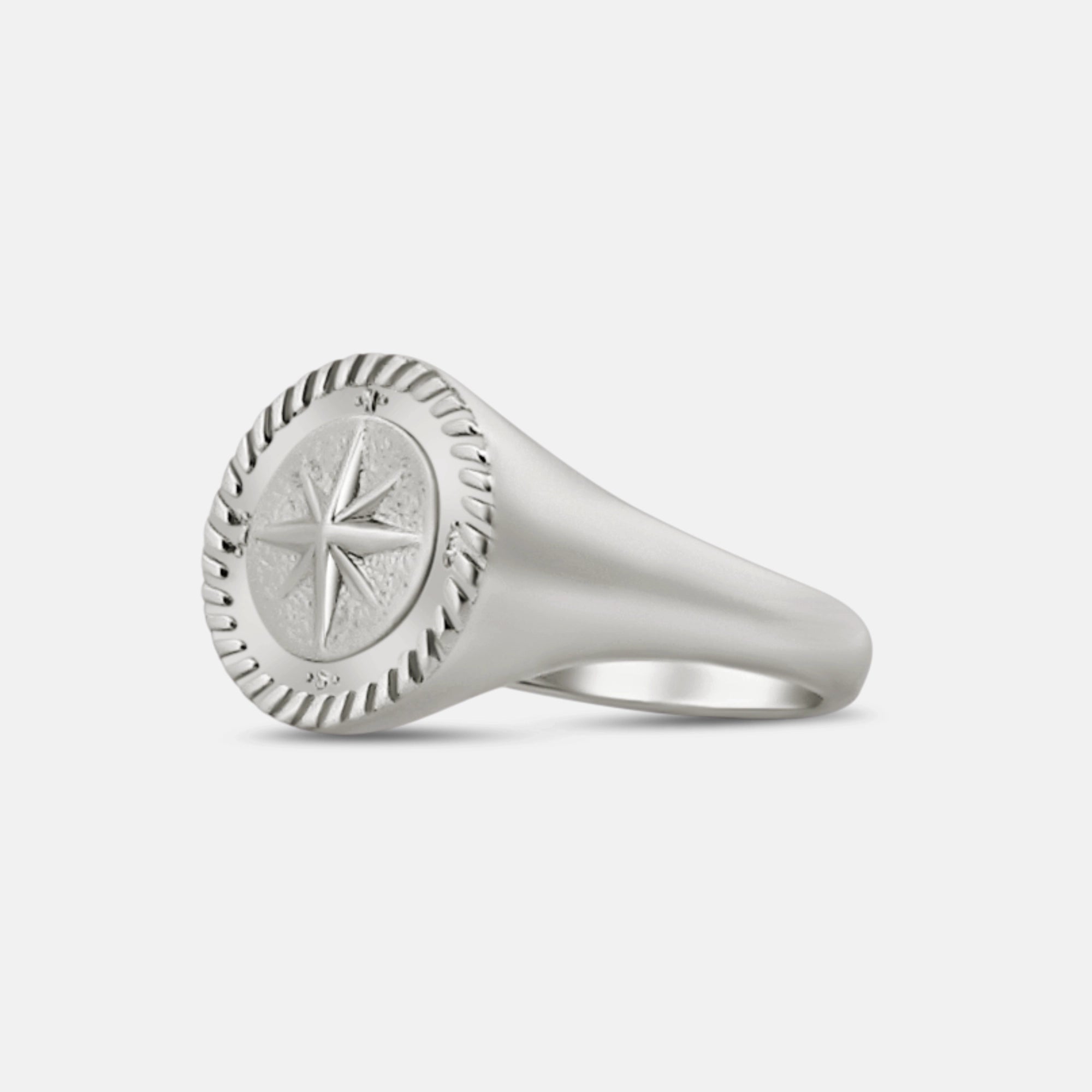 925 silver compass ring on hand side angle